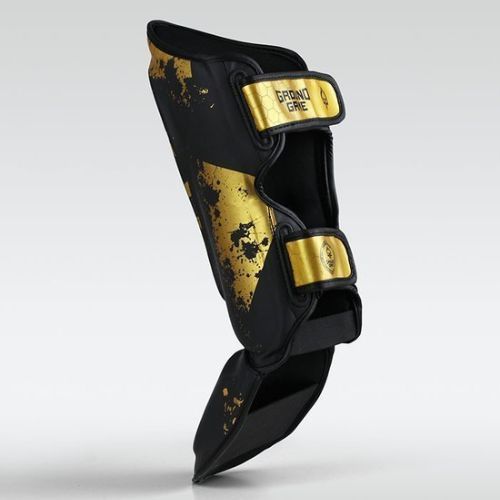 Ground Game Cage Gold protezioni per tibia nero/oro
