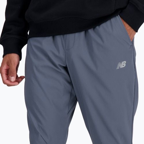 Pantaloni New Balance AC Stretch Woven 29 Inch da uomo in grafite