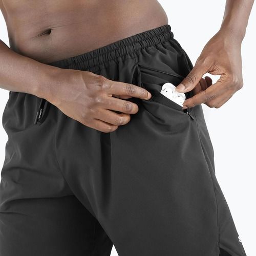 Pantaloncini da corsa Salomon SHAKEout Core 7" No Liner nero profondo da uomo