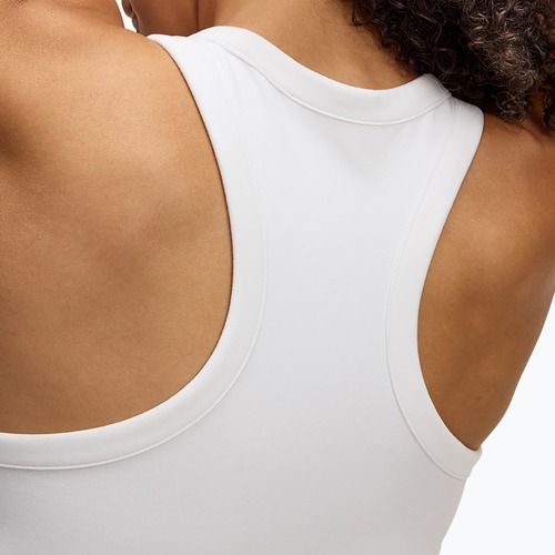 Under Armour Motion Canotta a collo alto bianca/nera da donna per l'allenamento