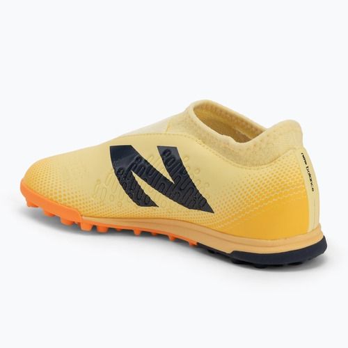 Scarpe da calcio per bambini New Balance Tekela Magique V4+ Jr TF beige