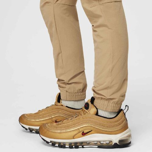 Pantaloni Nike Sportswear City Utility da bambino beige paracadute/nero