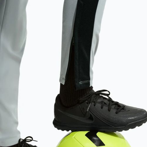 Pantaloni da bambino Nike Academy Dri-Fit Jr light smoke grey/white/black/metallic gold