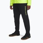 Pantaloni da corsa Under Armour Storm Run da uomo nero / giallo alta visibilità / riflettente
