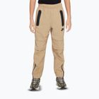 Pantaloni Nike Tech Woven da bambino paracadute beige/nero
