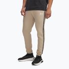 Pantaloni uomo Under Armour Icon Fleece Jgr city khaki/white