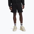 Pantaloncini uomo Under Armour Icon Fleece Taped Shorts ultimate black/white