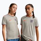 Maglietta da calcio per bambini Nike England Pre-Match pewter grey/bright crimson