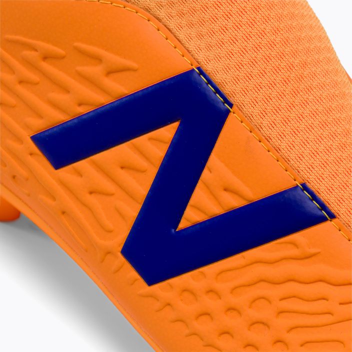 Scarpe da calcio per bambini New Balance Tekela V3+ Magique JNR FG impulso/arancio vibrante 7