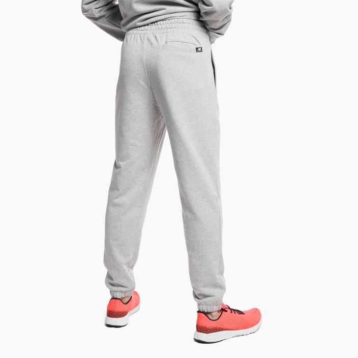 Pantaloni New Balance Essentials Stacked Logo French da uomo di colore grigio sportivo 3