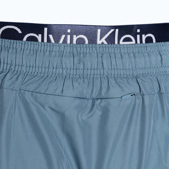 Pantaloncini da bagno corti Calvin Klein da uomo con doppia fascia in vita, colore ceruleo mutevole 4