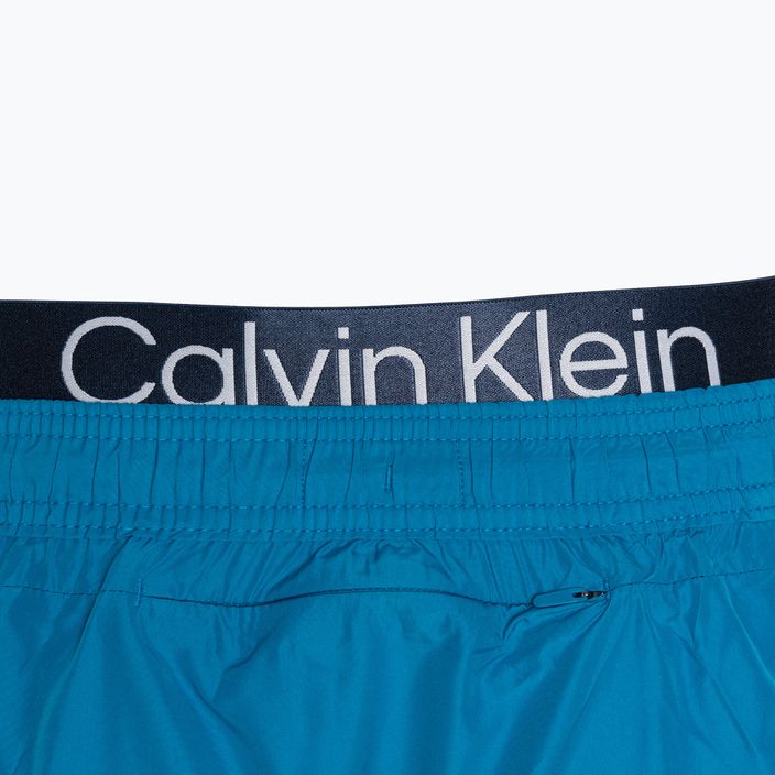 Pantaloncini da bagno corti Calvin Klein da uomo con doppia fascia in vita, tonalità oceano 4