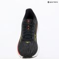 Scarpe da corsa da donna Mizuno Wave Rider 28 nero/primula serale/rosa rossa 9