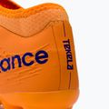 Scarpe da calcio per bambini New Balance Tekela V3+ Magique JNR FG impulso/arancio vibrante 8