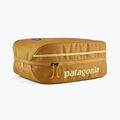 Patagonia Black Hole Cube pufferfish oro con borsa cosmetica in cera d'api