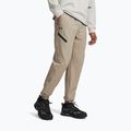 Pantaloni da allenamento da uomo Under Armour Unstoppable Joggers city khaki/black