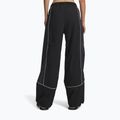 Pantaloni da donna Under Armour Unstoppable Woven Wind ultimate black/anthracite/anthracite 3