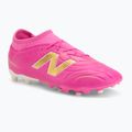 Scarpe da calcio per bambini New Balance Tekela Team V5 pink heat/metallic gold/pink satin
