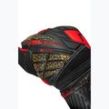 Guanti da portiere Reusch Attrakt Solid nero/oro/rosso fuoco 6