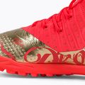 PUMA Future Z 3.4 Neymar Jr. scarpe da calcio per bambini. TT corallo infuocato/oro 9