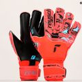 Guanto da portiere Reusch Attrakt Gold X Evolution Cut Finger Support rosso brillante/blu futuro/nero 9