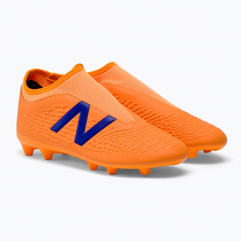 Scarpe da calcio per bambini New Balance Tekela V3+ Magique JNR FG impulso/arancio vibrante 4