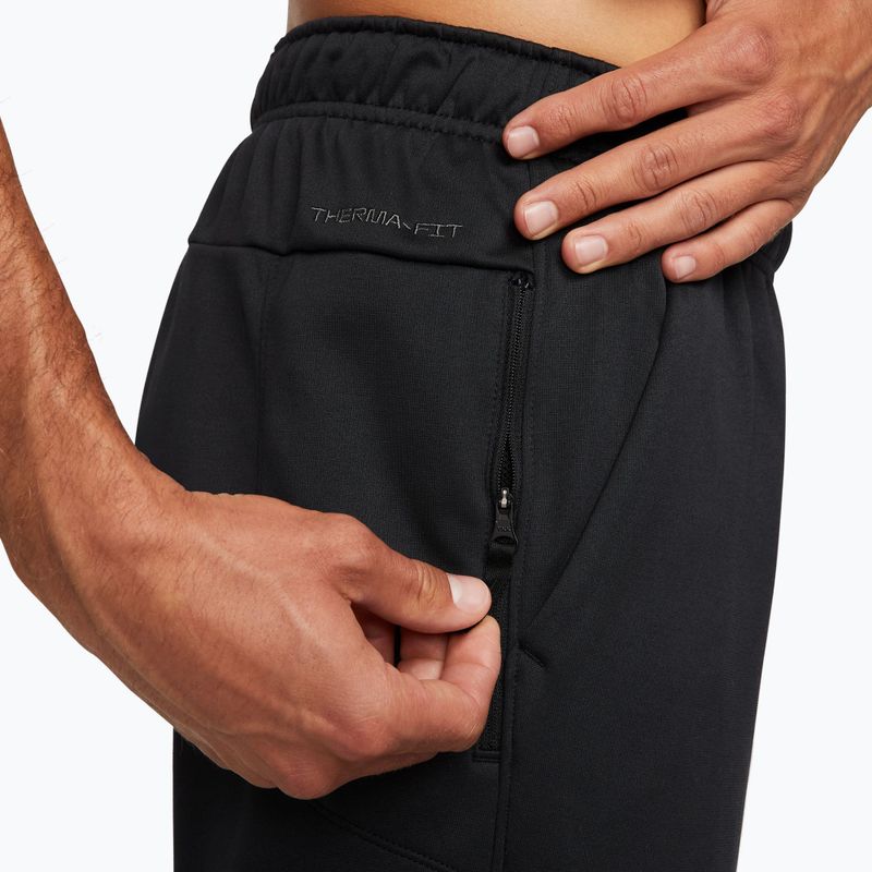 Pantaloni da allenamento da uomo Nike Therma-FIT Open Hem black/black/white 4