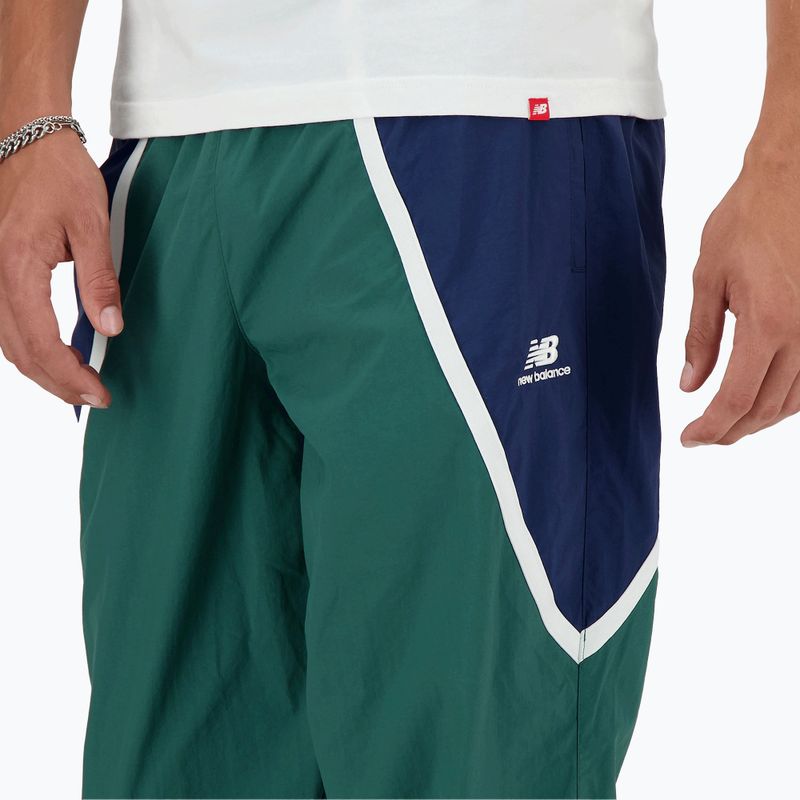 Pantaloni New Balance da uomo Hoops Woven squadra verde bosco 4