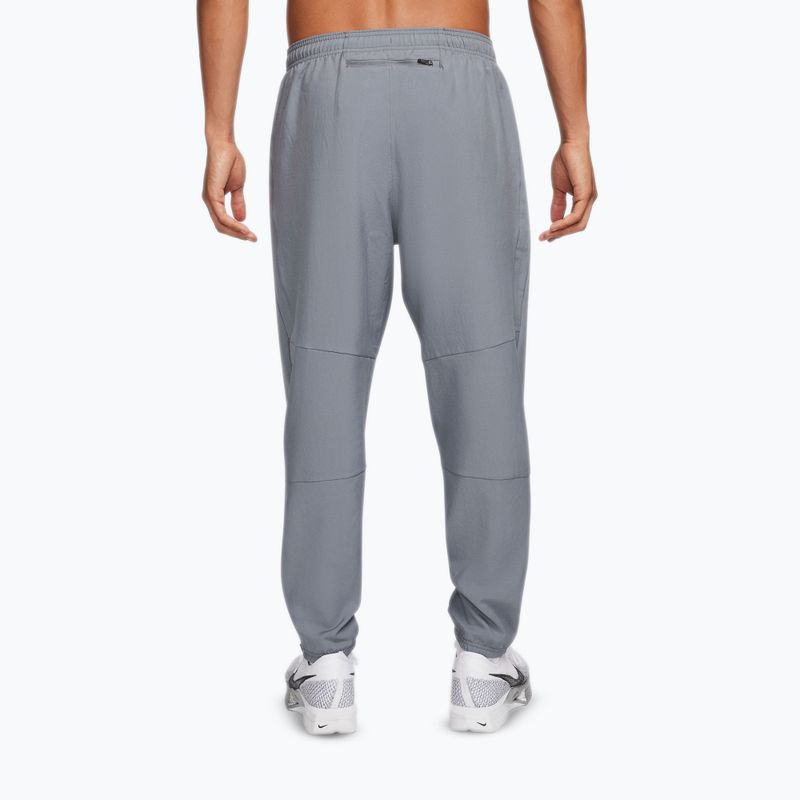 Pantaloni uomo Nike Dri-Fit Challenger Woven smoke grey/black 3