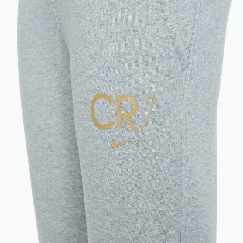 Pantaloni Nike CR7 Club Fleece da bambino grigio fumo chiaro / erica / oro metallico 4