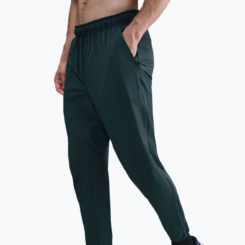 Pantaloni uomo Nike Unlimited Dri-Fit Zippered Cuff seaweed/black/seaweed 4