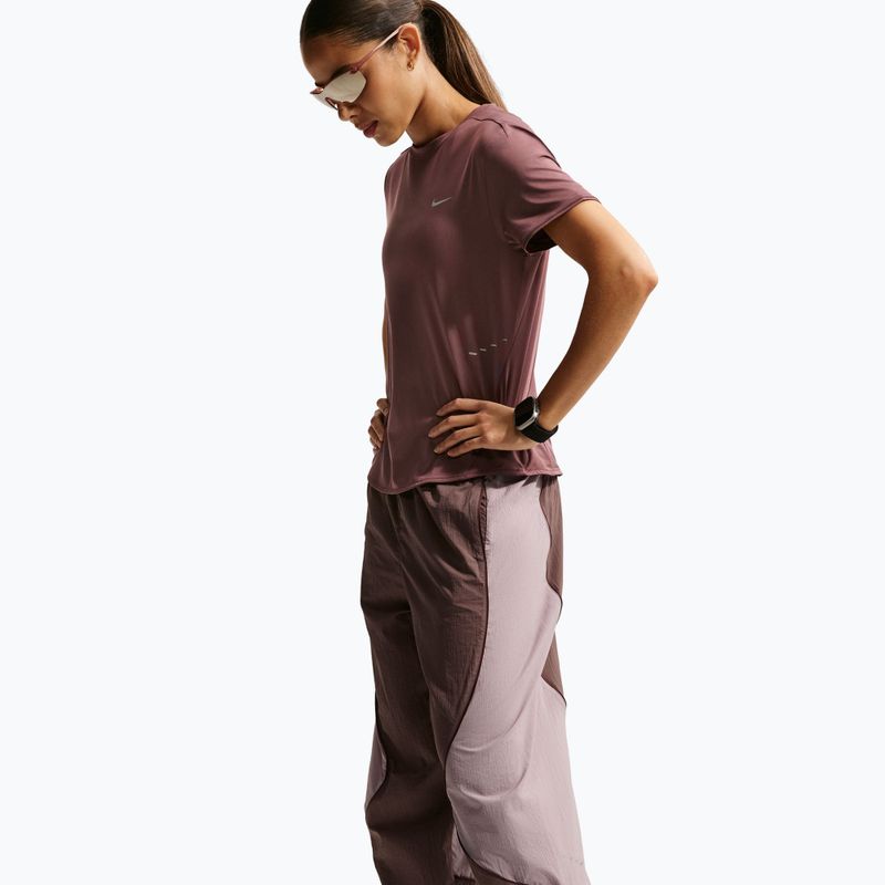 Pantaloni da running donna Nike Swift UV Repel Mid-Rise tattoo/light violet ore 6