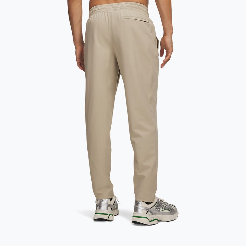Pantaloni da allenamento da uomo Under Armour Unstoppable Tapered Pants city khaki/black 3
