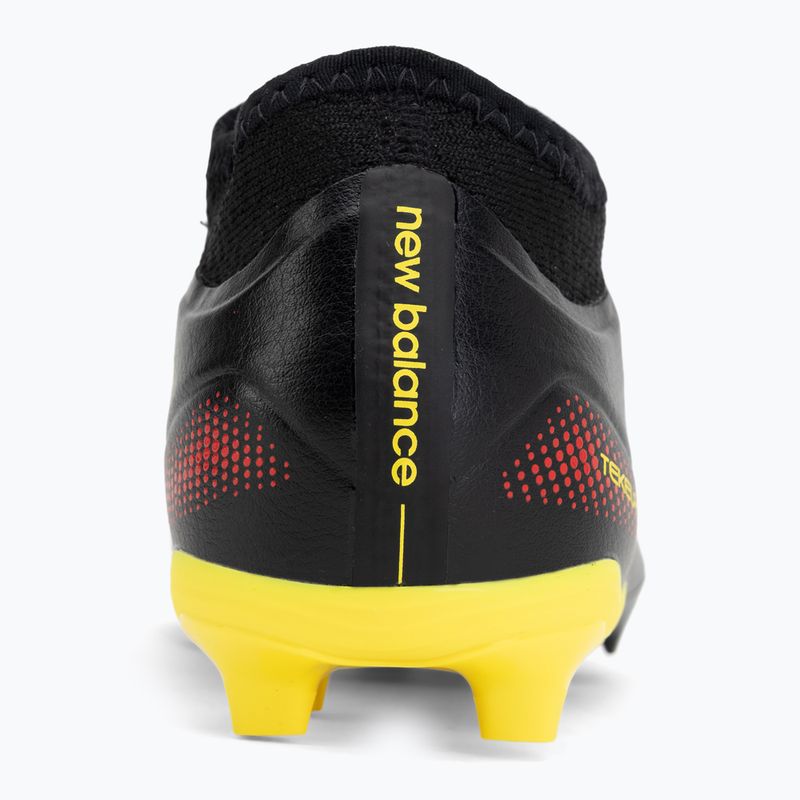 Scarpe da calcio per bambini New Balance Tekela Team V5 black 100/punch yellow/fire cracker 6