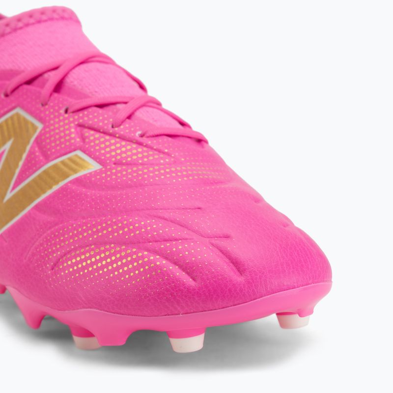 Scarpe da calcio per bambini New Balance Tekela Team V5 pink heat/metallic gold/pink satin 7