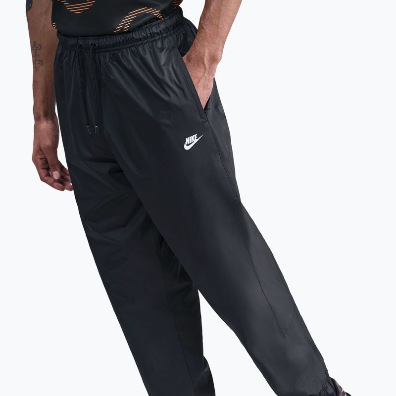 Pantaloni uomo Nike Windrunner Lined black/white 4