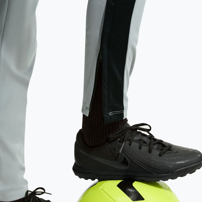 Pantaloni da bambino Nike Academy Dri-Fit Jr light smoke grey/white/black/metallic gold 7