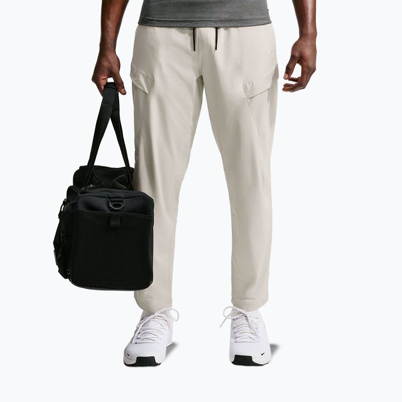 Pantaloni da uomo Nike Unlimited ight orewood brown/black/light orewood brown 7