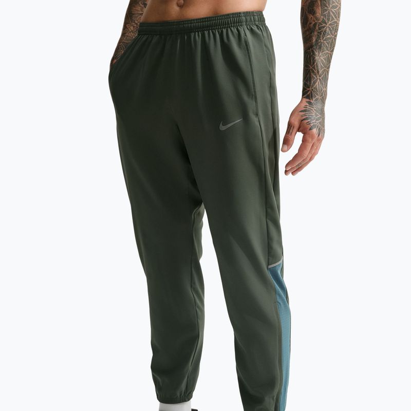 Pantaloni da running da uomo Nike Miler Dri-Fit Woven camo green/mineral slate 4
