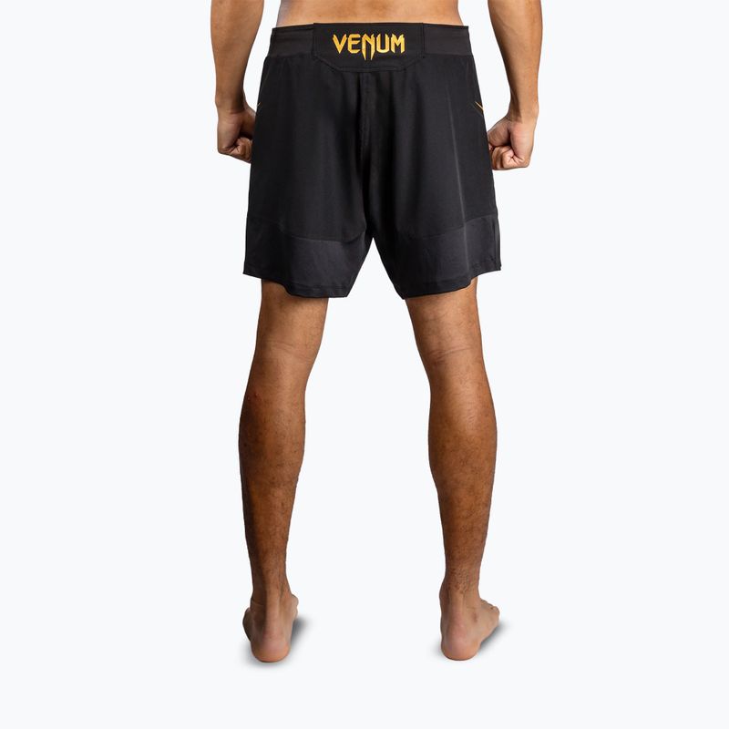 Pantaloncini da allenamento uomo Venum G-Core Fight black/gold 3