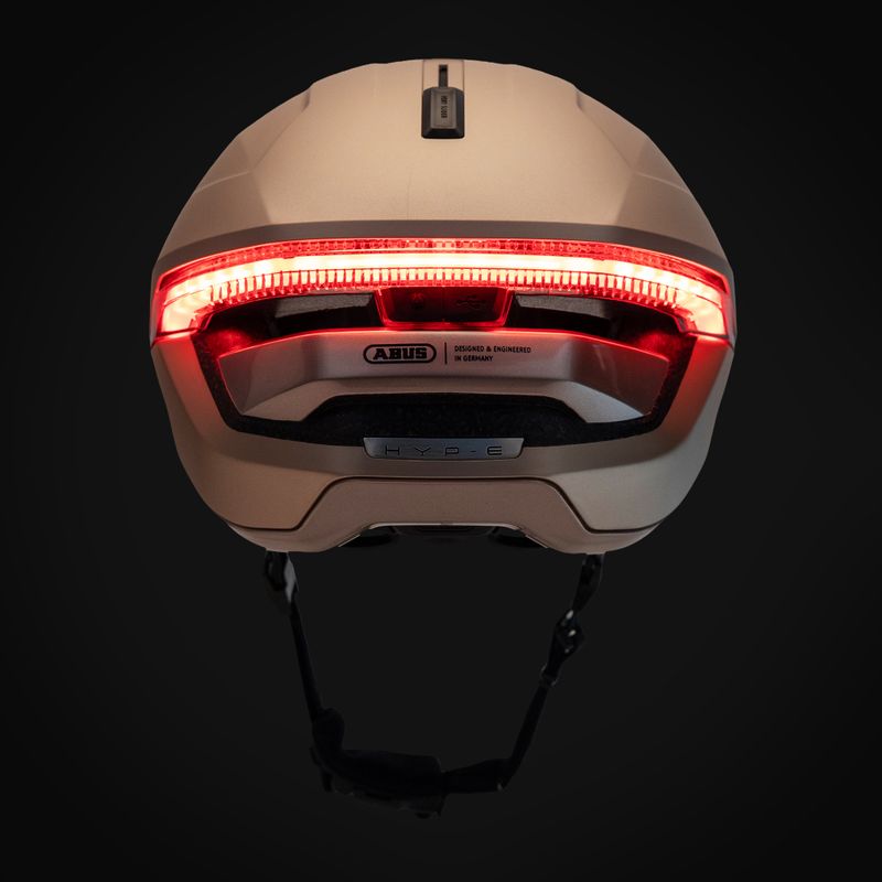 Casco da bici con indicatori di direzione ABUS Hyp-E champagne gold 9