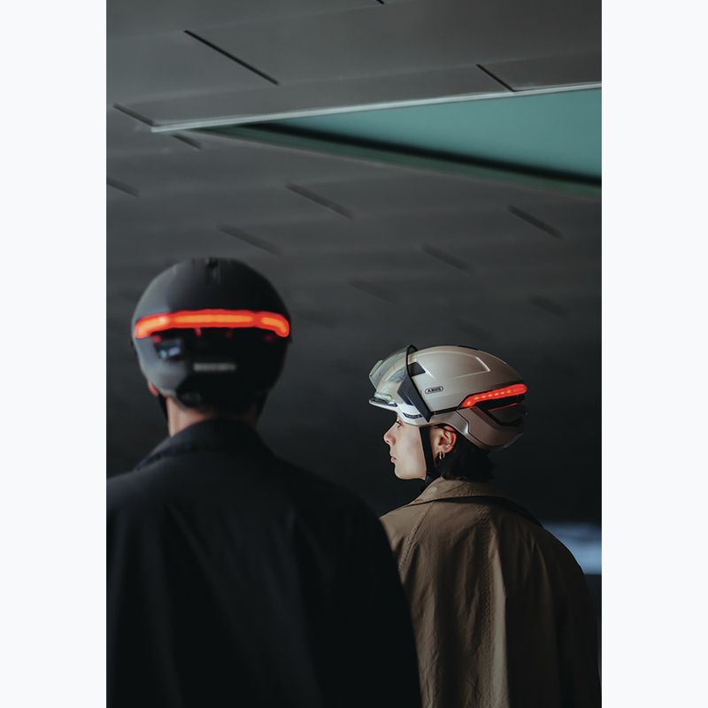 Casco da bici con indicatori di direzione ABUS Hyp-E champagne gold 8