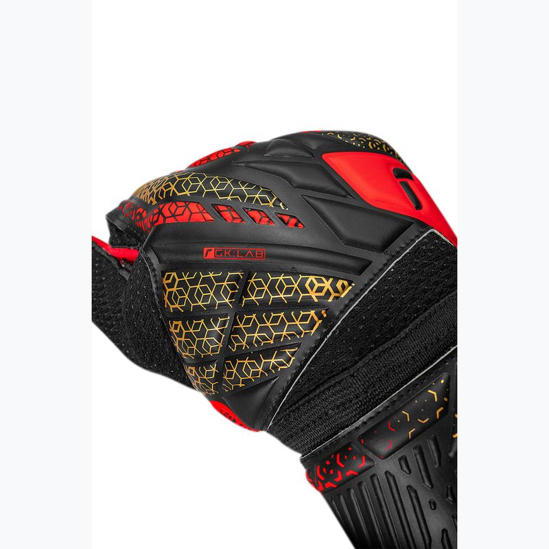 Guanti da portiere Reusch Attrakt Solid nero/oro/rosso fuoco 6