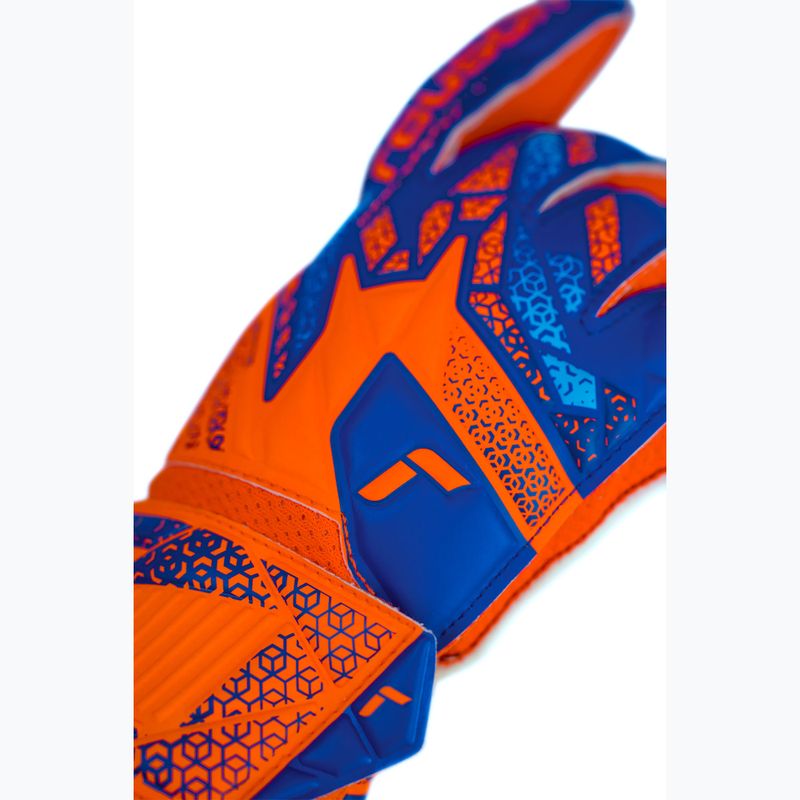 Guanti da portiere per bambini Reusch Attrakt Solid Junior arancione/blu shocking 6