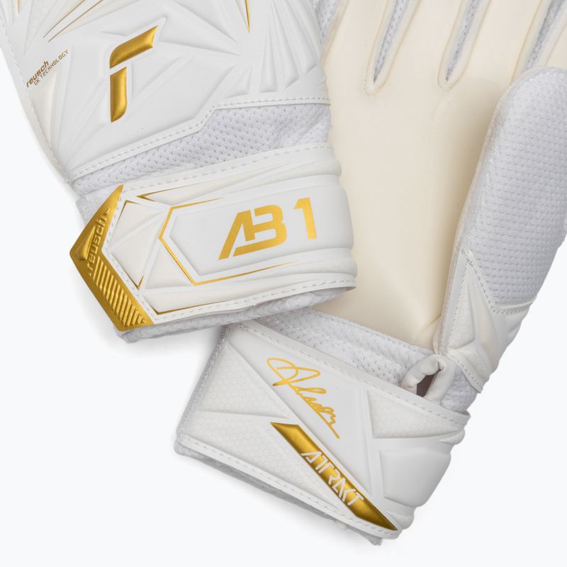 Guanti da portiere per bambini Reusch Attrakt AB1 Solid Junior white/gold 5