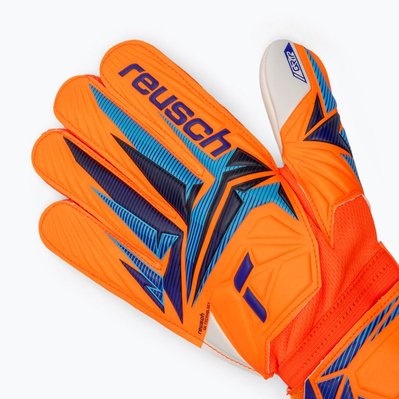 Guanti da portiere per bambini Reusch Attrakt Grip Junior shocking orange/blue 4