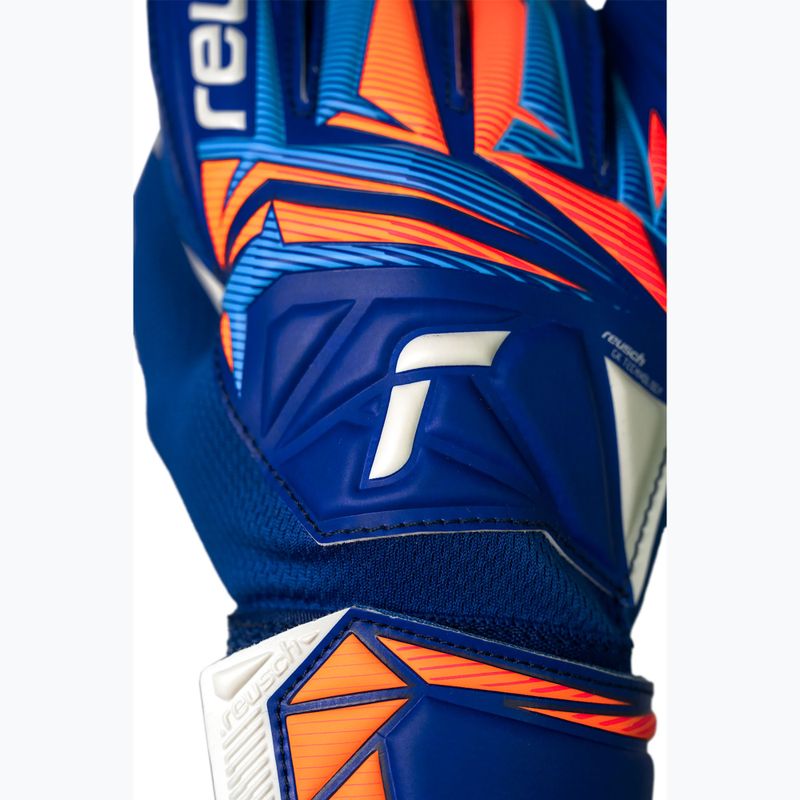 Guanti da portiere per bambini Reusch Attrakt Starter Solid Junior sharp blue/white/shocking orange 6