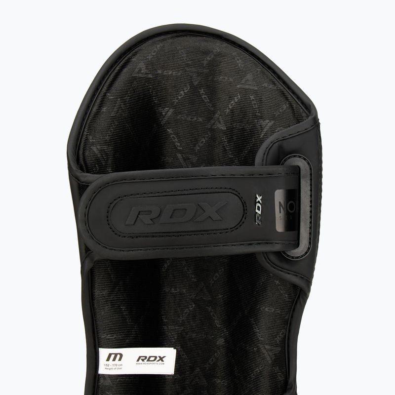 Protezioni RDX T15 Shin Instep nere per tibia e piede 6