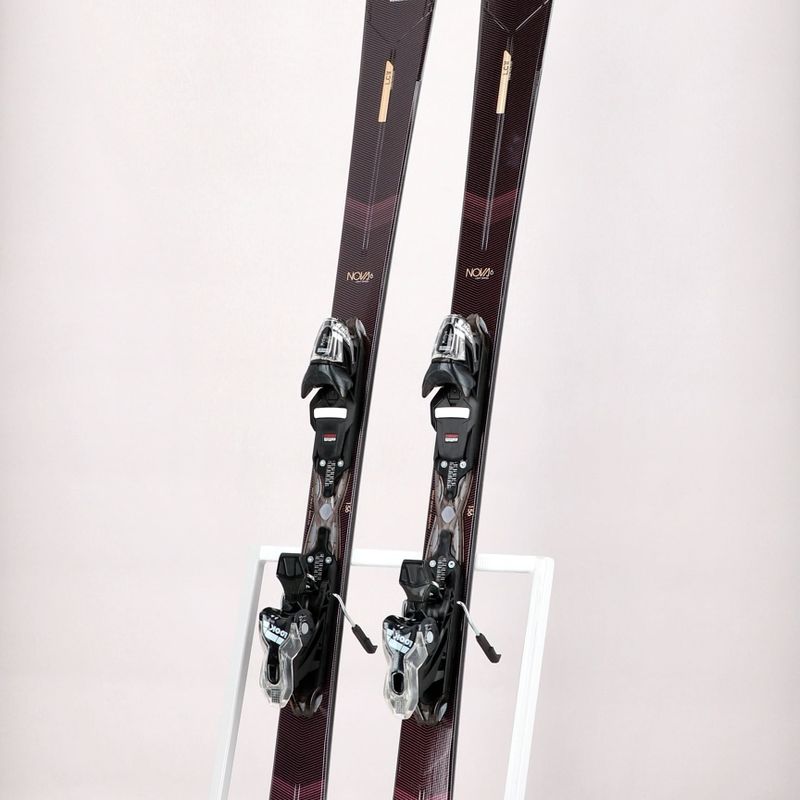 Sci da discesa femminile Rossignol Nova 6 + attacchi XP W 11 GW nero/oro 11