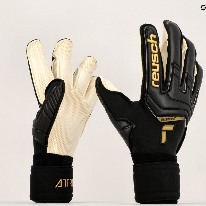 Guanti da portiere Reusch Attrakt Gold X GluePrint nero/oro 8